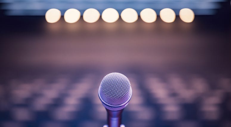 Microphone over a blurred background.