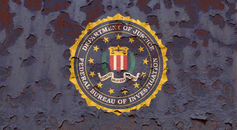 Flag of the Federal Bureau of Investigation on a rusty background