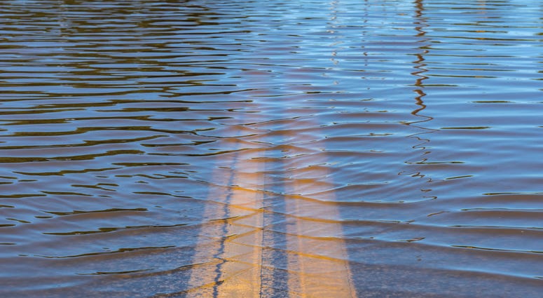High water flooding with roadway underneath