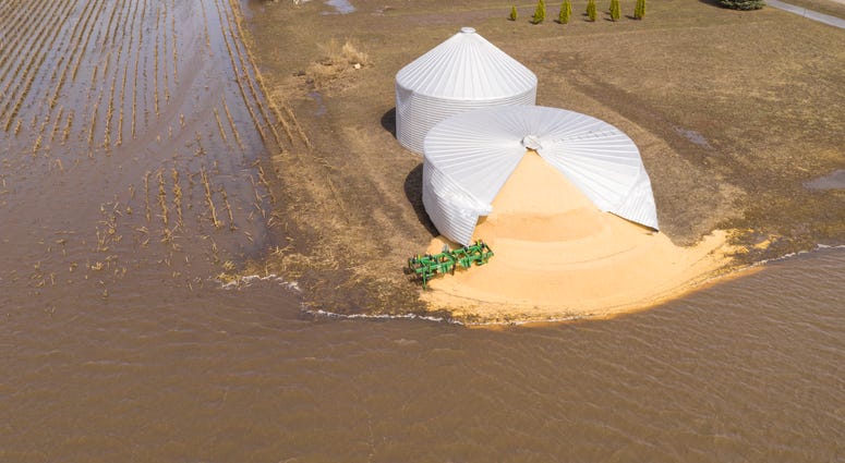 Iowa farm silo burst by Midwest flooding March 2019