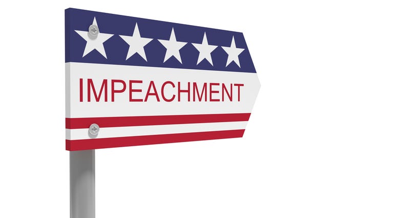 Impeachment Direction Sign With US Flag