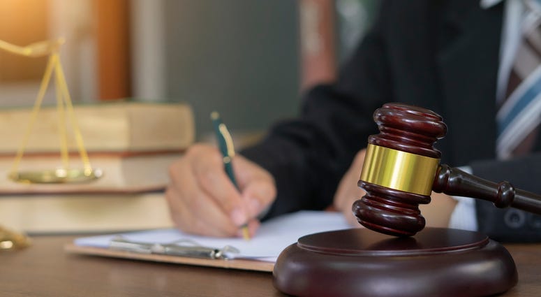Attorney says KU researcher denies concealing Chinese work