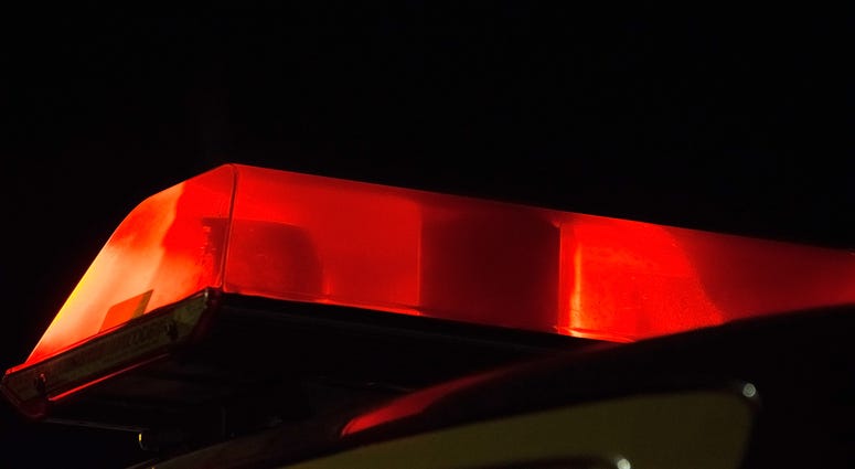 Emergency beacon lights flashing on vehicle