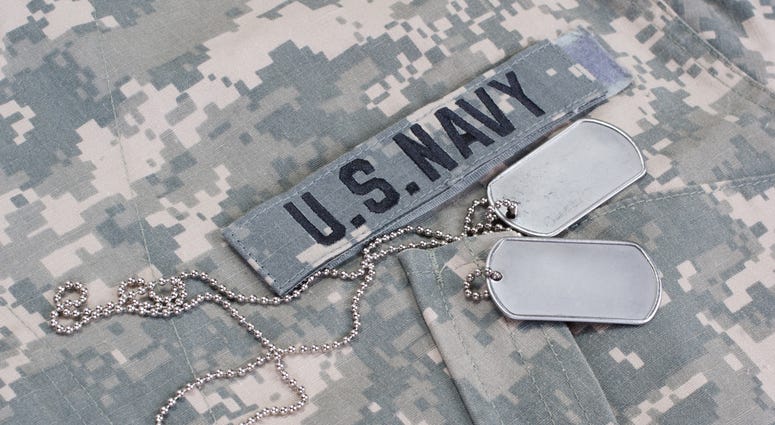 U.S. Navy camouflaged uniform with blank dog tags