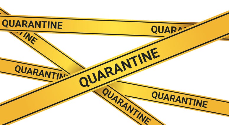 Quarantine caution on yellow warning tape coronavirus infection