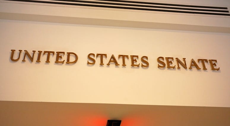 A sign marks an entrance to the United States Senate in the US Capitol building