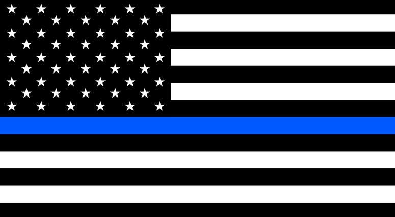 USA flag with a thin blue line - a sign to honor and respect american police, army and military officers