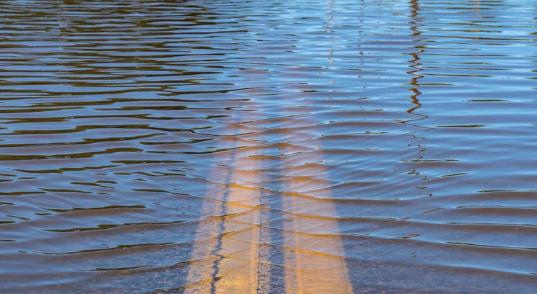 High water flooding with roadway underneath
