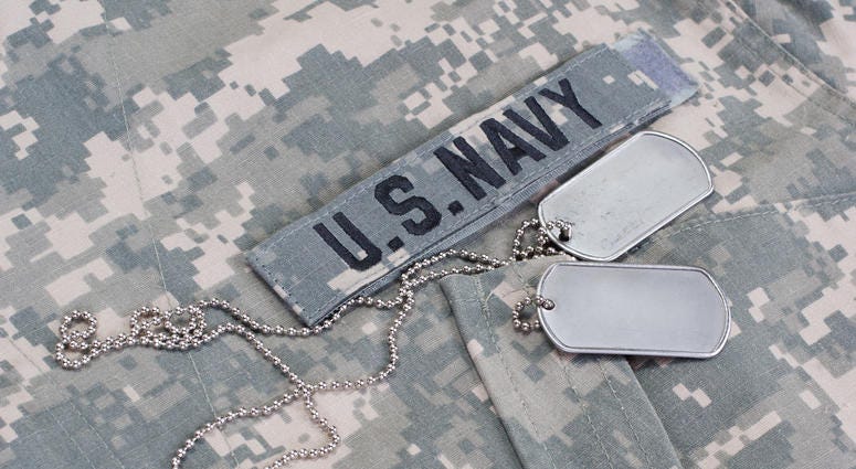U.S. Navy camouflaged uniform with blank dog tags