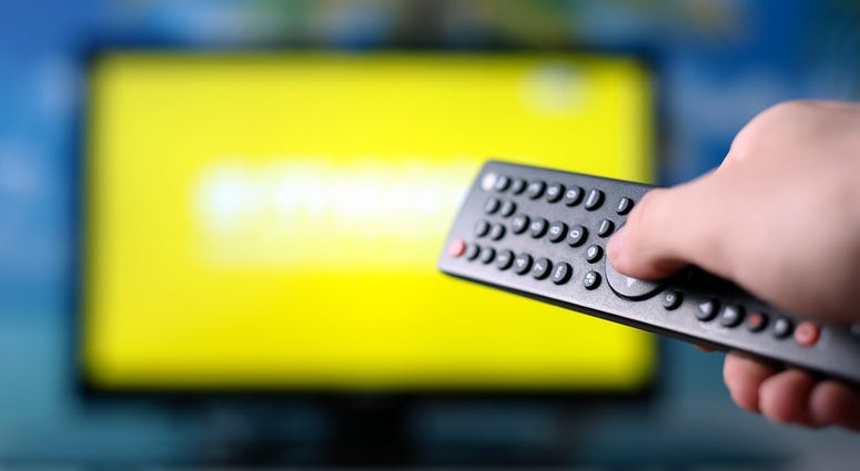 Watching TV and using remote controller