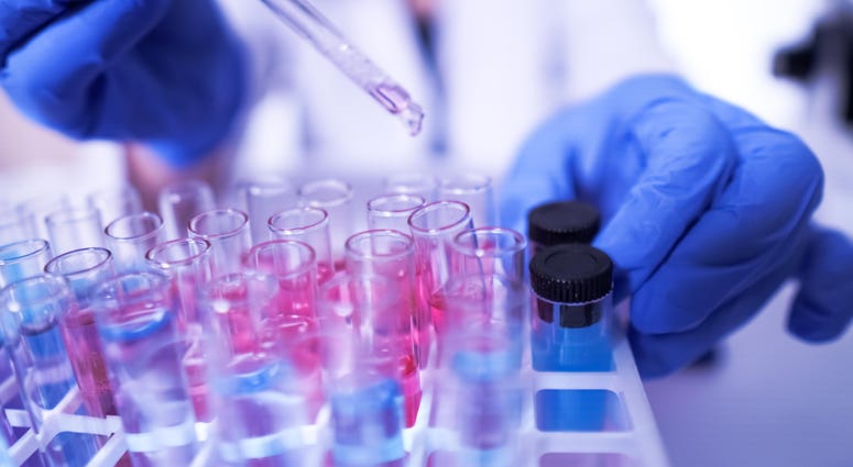 Lab technician doing research with the coronavirus