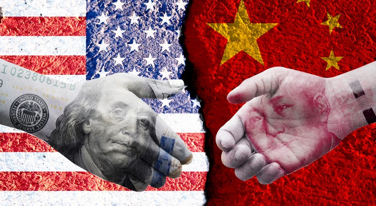 US dollar and China Yuan banknote print screen on handshake with both flags countries