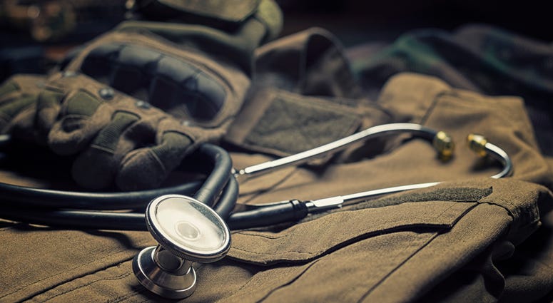 Stethoscope lies on the uniform of a US soldier
