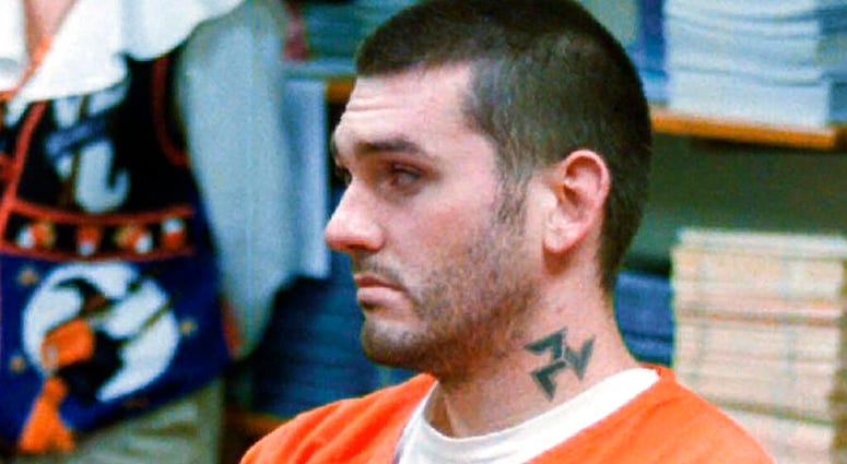 Daniel Lewis Lee waits for his arraignment hearing for murder in the Pope County Detention Center in Russellville, Ark (AP)