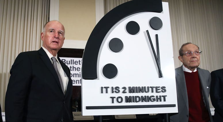 ANUARY 24: Former California Governor Jerry Brown, (L) and former U.S. Secretary of Defense William Perry unveil the Doomsday Clock during The Bulletin of the Atomic Scientists news conference, on January 24, 2019 in Washington, DC.