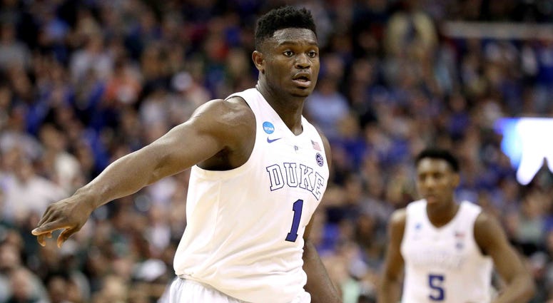 Zion Williamson Zion Williamson points on defense during a game at Duke.