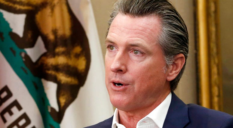 This Oct. 8, 2019, file photo, shows California Gov. Gavin Newsom during an interview in his office at the Capitol in Sacramento, Calif.