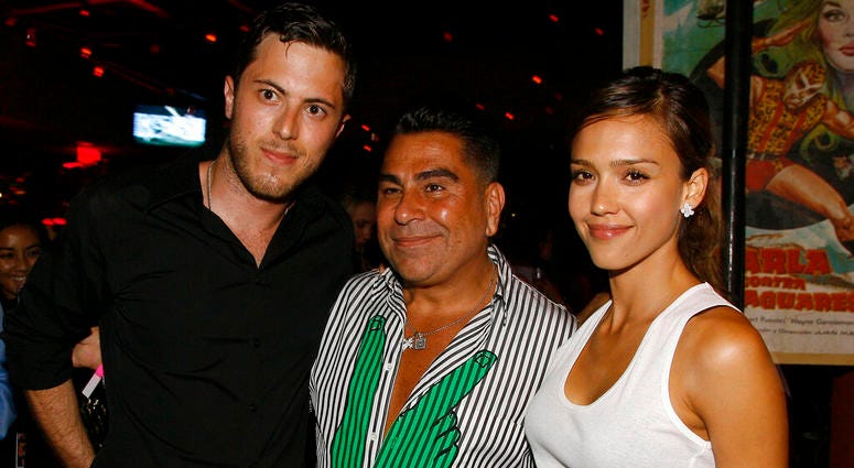 June 28, 2007 file photo, Harry Morton, left, Luis Barajas, center, founder of Flaunt magazine, and Jessica Alba are seen at the opening of the Pink Taco restaurant in Los Angeles.
