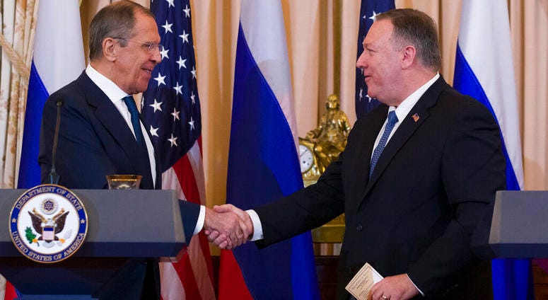 Secretary of State Mike Pompeo, right, departs with with Russian Foreign Minister Sergey Lavrov, after a media availability at the State Department, Tuesday, Dec. 10, 2019, in Washington.