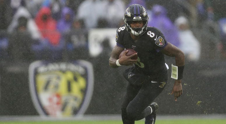 Quarterback Lamar Jackson #8 of the Baltimore Ravens rushes against the San Francisco 49ers during the third quarter at M&T Bank Stadium on December 01, 2019 in Baltimore, Maryland.