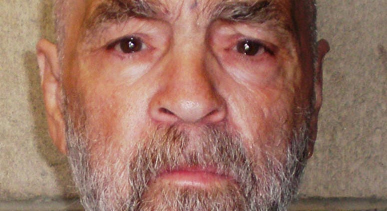 In this handout photo from the California Department of Corrections and Rehabilitation, Charles Manson, 74, poses for a photo on March 18, 2009 at Corcoran State Prison, California.