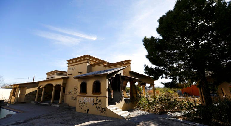 A view of a home torched by the Zetas cartel eight years back, in Allende, Coahuila state, Mexico, Tuesday, Dec. 3, 2019.