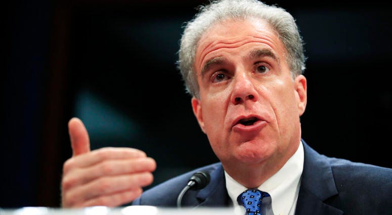In this June 19, 2018, file photo, Department of Justice Inspector General Michael Horowitz testifies before a joint House Committee on the Judiciary and House Committee on Oversight and Government Reform hearing on Capitol Hill in Washington.