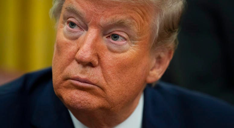 President Donald Trump listens during an event to sign an executive order establishing the Task Force on Missing and Murdered American Indians and Alaska Natives, in the Oval Office of the White House, Tuesday, Nov. 26, 2019, in Washington.