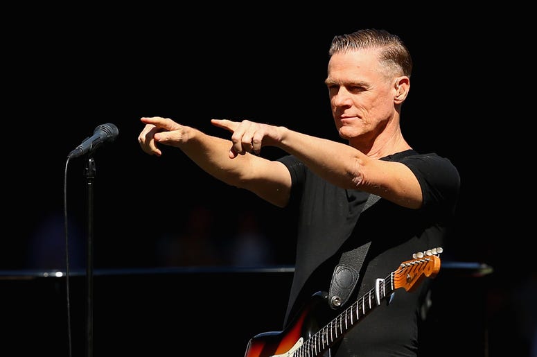2015 AFL Grand Final - Hawthorn v West Coast MELBOURNE, AUSTRALIA - OCTOBER 03: Bryan Adams performs during the 2015 AFL Grand Final match between the Hawthorn Hawks and the West Coast Eagles at Melbourne Cricket Ground on October 3, 2015 in Melbourne, A