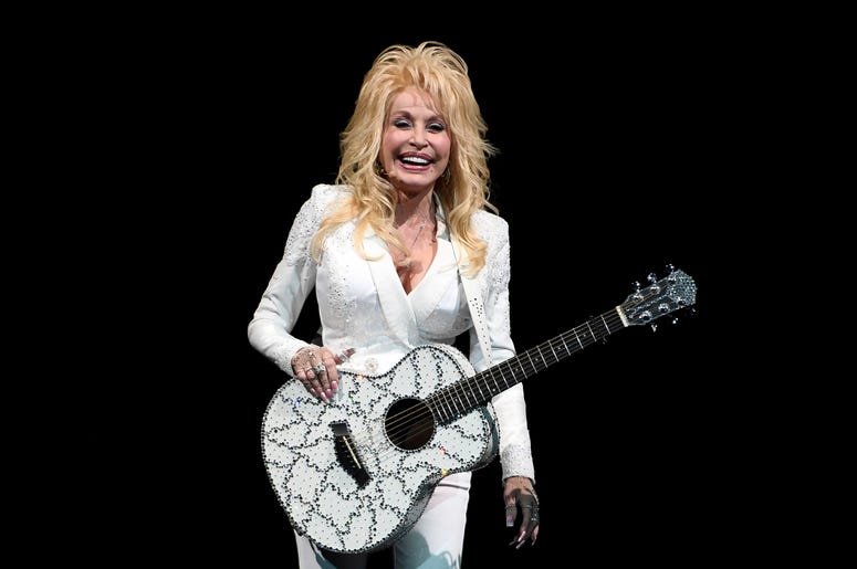 Nov 27, 2016; Sunrise, FL, USA; Dolly Parton performs at the BB&T Center. Mandatory Credit: Ron Elkman/USA TODAY NETWORK Nov 27, 2016; Sunrise, FL, USA; Dolly Parton performs at the BB&T Center. Mandatory Credit: Ron Elkman/USA TODAY NETWORK