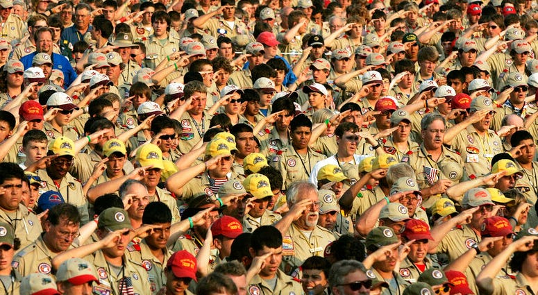 Boy Scouts Boy Scouts salute as they recite the Pledge of Allegiance during the Boy Scout Jamboree