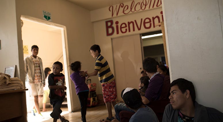 Central American migrants traveling with a caravan wait to be registered at the Viña de Cristo shelter in Tijuana, Mexico, Wednesday, April 25, 2018. The caravan of mainly Central American migrants are planning to request asylum, either in the United Stat