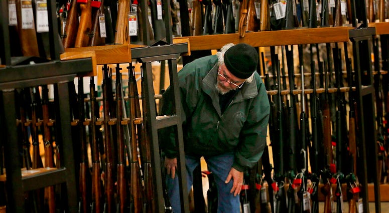 Gun background checks are on pace to break record Gun background checks are on pace to break record