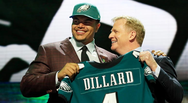 Andre Dillard Eagles Philadelphia Eagles rookie Andre Dillard poses with NFL commissioner Roger Goodell at the 2019 NFL Draft.