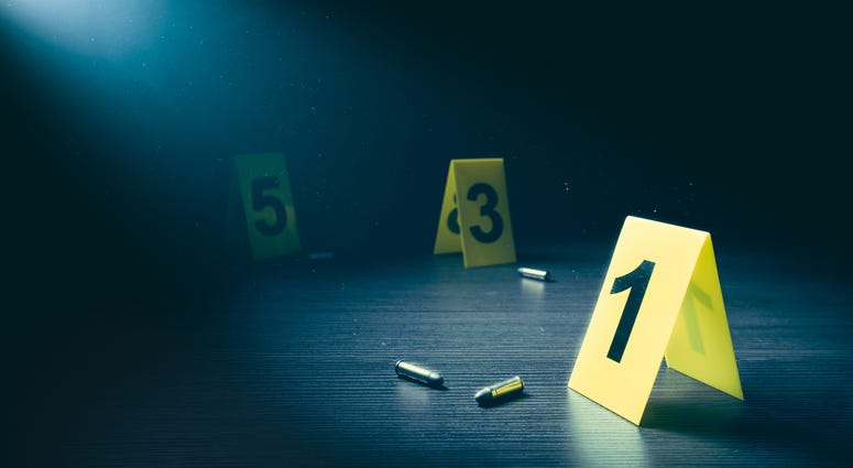 Crime scene with evidence markers Crime scene with evidence markers