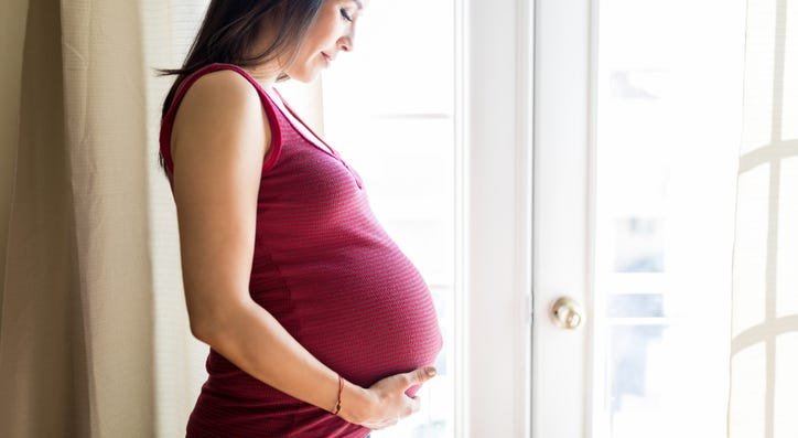 Woman Enjoying Pregnancy Woman Enjoying Pregnancy