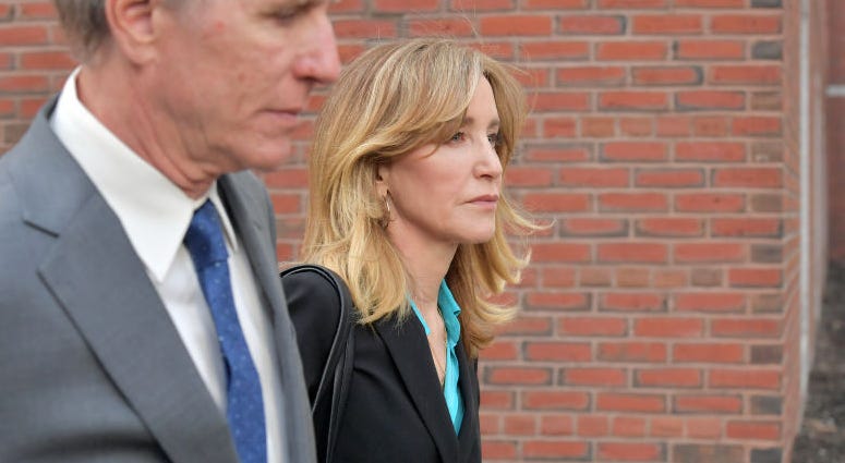 Felicity Huffman Felicity Huffman exits the John Joseph Moakley U.S. Courthouse after appearing in Federal Court to answer charges stemming from college admissions scandal on April 3, 2019 in Boston, Massachusetts