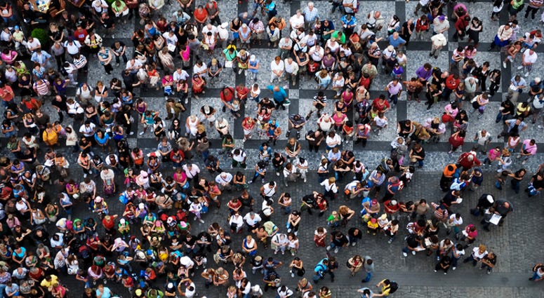 Aerial photograph of people gathered in a square Aerial photograph of people gathered in a square