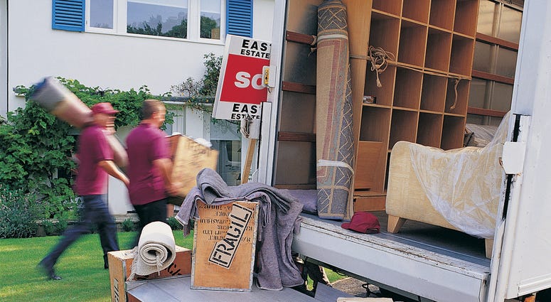 Movers Unloading Moving Van Movers Unloading Moving Van