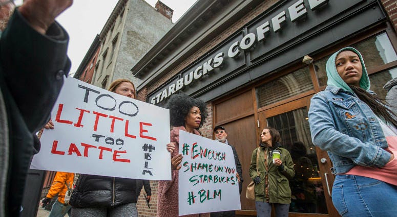 Protesters gather outside of a Starbucks in Philadelphia Protesters gather outside of a Starbucks in Philadelphia