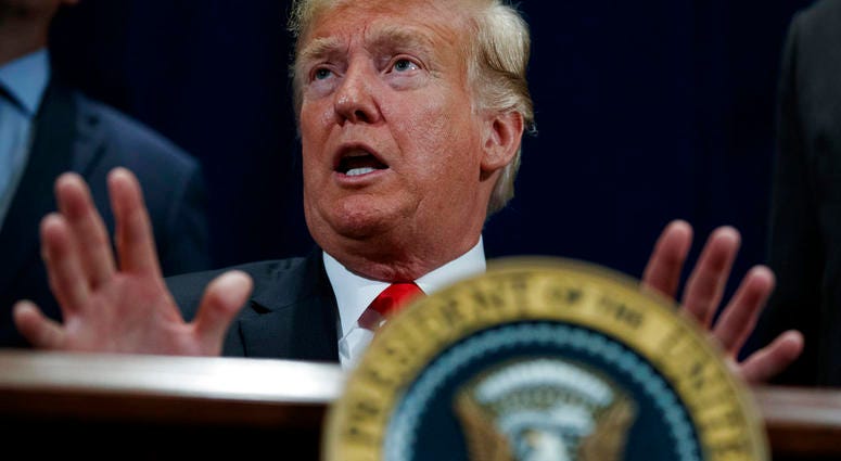 President Trump Campaigns Trump's Campaign Mode Revives Fiery Immigration Talk