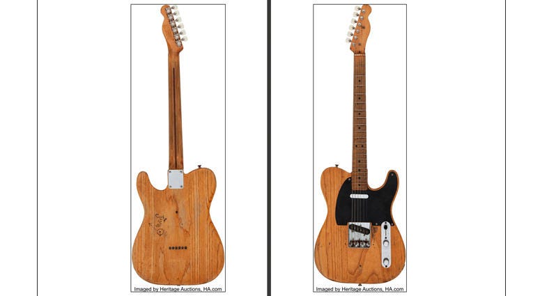 AP - SRV Guitar This undated file photo provided by Heritage Auctions shows an electric guitar that blues legend Stevie Ray Vaughan was given as a youth by his brother. The guitar, which Vaughan used in his first studio recording and early performances, has fetched $250