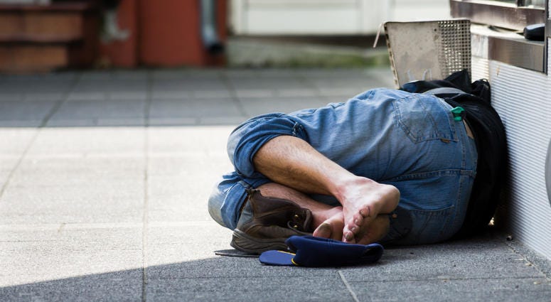 Homeless Homeless man sleeping on the street