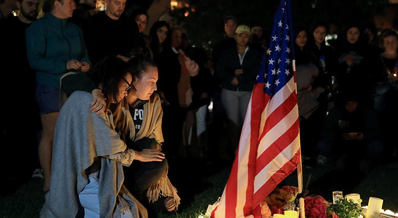 Thousand Oaks Shooting People attend the memorial to mourn the victims of the mass shooting in Thousand Oaks, California,