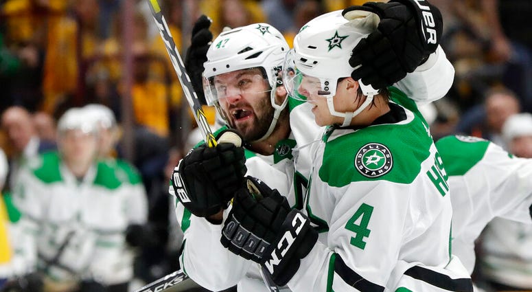 Dallas Stars Dallas Stars right wing Alexander Radulov (47) celebrates with defenseman Miro Heiskanen (4)