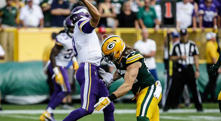 Green Bay Packers’ Clay Matthews tackles Minnesota Vikings quarterback Kirk Cousins Green Bay Packers’ Clay Matthews tackles Minnesota Vikings quarterback Kirk Cousins