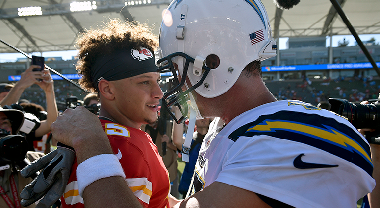 Kansas City Chiefs quarterback Patrick Mahomes, left, greets Los Angeles Chargers quarterback Philip Rivers Kansas City Chiefs quarterback Patrick Mahomes, left, greets Los Angeles Chargers quarterback Philip Rivers