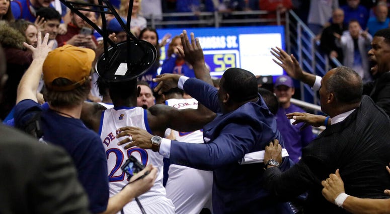 Kansas State at Kansas A fight between players spills into the crowd during the second half of an NCAA college basketball game between Kansas and Kansas State in Lawrence, Kan.,