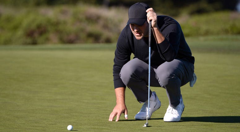 Tony Romo lines up a putt on the 13th green during the second round of the AT&T Pebble Beach Pro-Am golf tournament at Monterey Peninsula Country Club Tony Romo lines up a putt on the 13th green during the second round of the AT&T Pebble Beach Pro-Am golf tournament at Monterey Peninsula Country Club