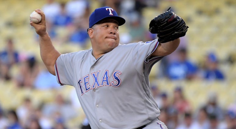 Texas Rangers starting pitcher Bartolo Colon Texas Rangers starting pitcher Bartolo Colon